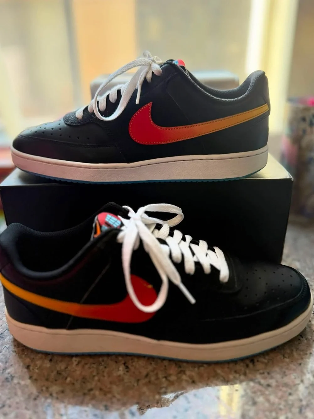 Nike Men's Black Sneakers with Red-to-Orange Gradient Swoosh